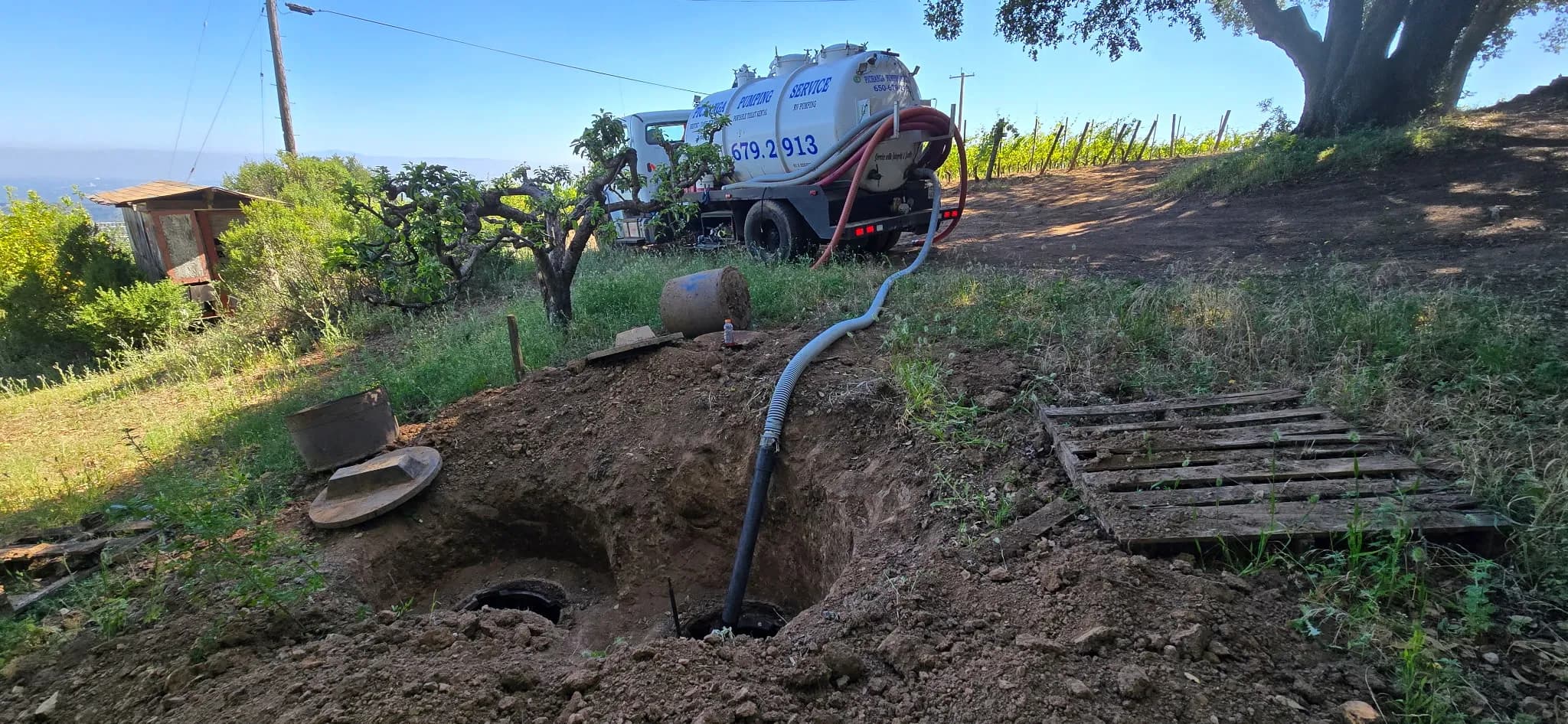 Pichanga Pumping Service truck on a job site